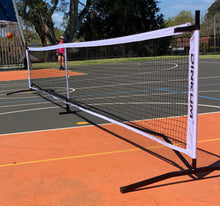Load image into Gallery viewer, In Stock! Dinkum® Pickleball Net. Carry bag with wheels. High tension - never sags. Only 2 clips.