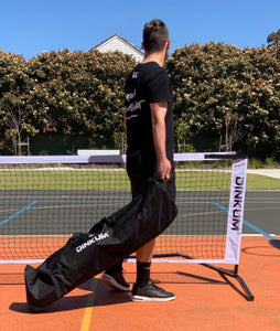 Dinkum® pickleball net. Carry bag with wheels can fit 4 paddles! Premium quality. High tension net fabric. Quick setup.